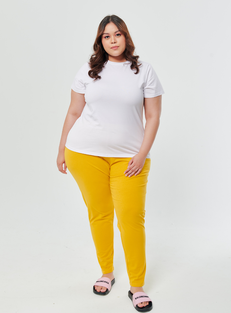 A woman wearing Yellow Basic Cotton Legging