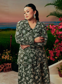 A woman dressed in Army Green Tun Habiba Eyelet Set