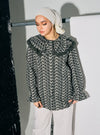 A woman dressed in Army Maisara Eyelet Ruffles Top