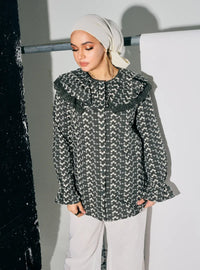A woman dressed in Army Maisara Eyelet Ruffles Top