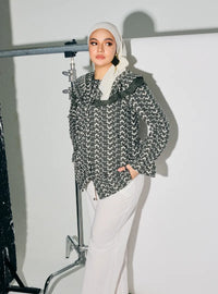 A woman dressed in Army Maisara Eyelet Ruffles Top