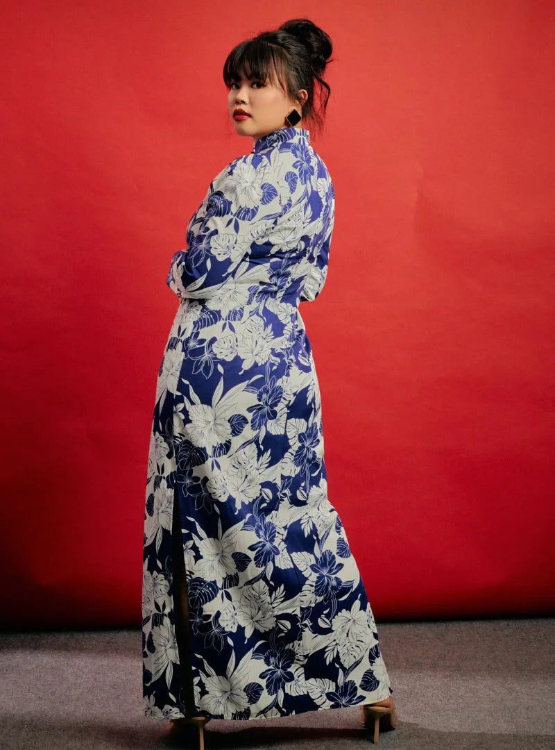 A woman dressed in Blue Ocean Leng Jie Cheongsam Dress