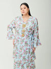 A woman dressed in Baby Blue Tun Salma 3D Chiffon Fleur Wrap-