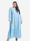 A woman dressed in Baby Blue Ms Wiwiana Maxi Dress with Long Elastic Princess Sleeves