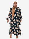 A woman dressed in Black Aminah Kurung Modern
