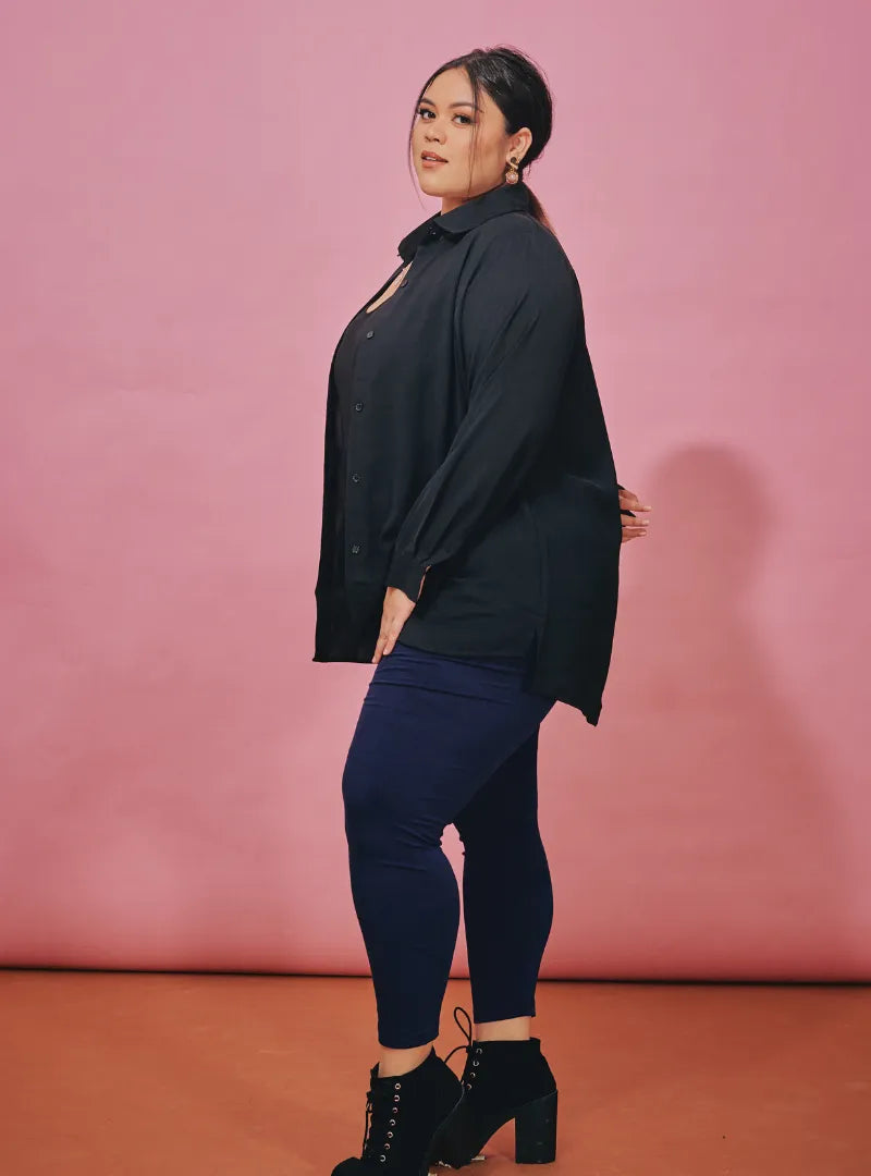 A woman dressed in Black Basic Shirt With Covered Button