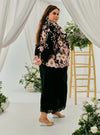 A woman dressed in Black Daisy Tun Jaeda Kebaya Nyonya Kurung