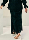 A woman wearing Black Ezzah Eyelet Doll Skirt