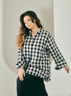 A woman dressed in Black Jennie Oversized Checked Cotton Shirts