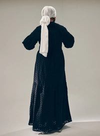 A woman dressed in Black Lola Cotton Eyelet Princess Dress