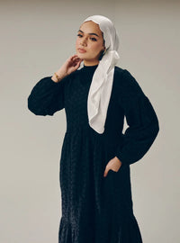 A woman dressed in Black Lola Cotton Eyelet Princess Dress