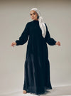 A woman dressed in Black Lola Cotton Eyelet Princess Dress