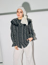 A woman dressed in Black Maisara Eyelet Ruffles Top