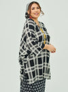 A woman dressed in Black Tanah Tun Azeeza Kaftan Top