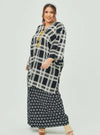 A woman dressed in Black Tanah Tun Azeeza Kaftan Top
