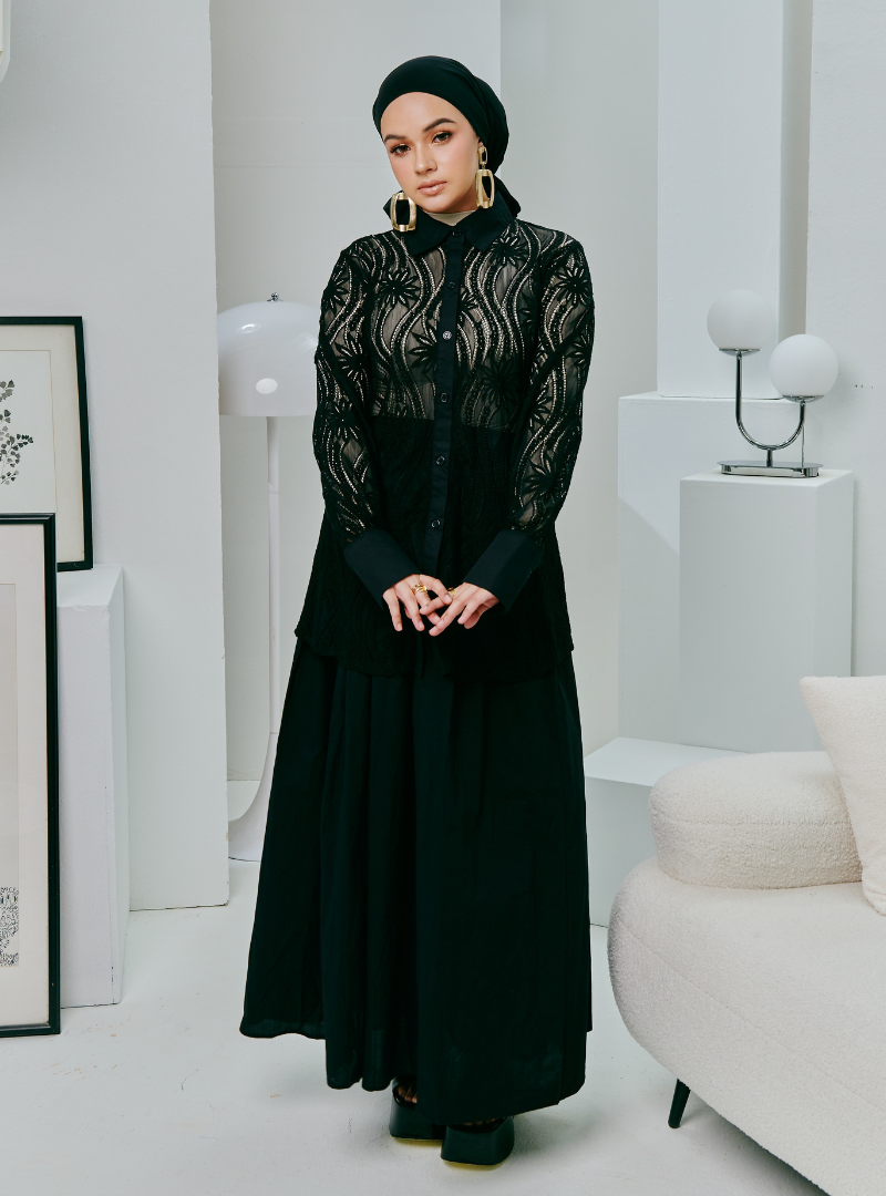 A woman dressed in Black Fiona Regular Lace Shirt