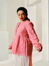 A woman dressed in Bomb Shell Arya Peplum Top