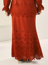 A woman wearing Brick Orange Ezzah Eyelet Doll Skirt