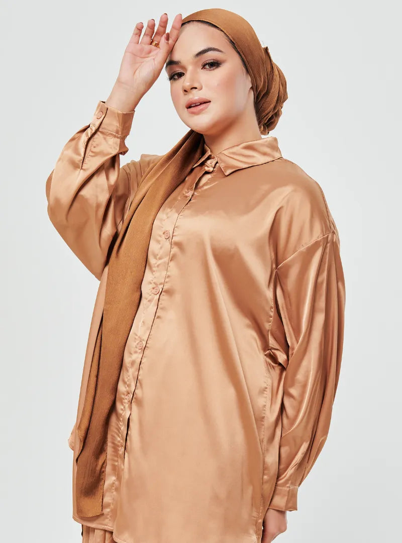 A woman dressed in Camel Dropped Shoulder Satin Shirt
