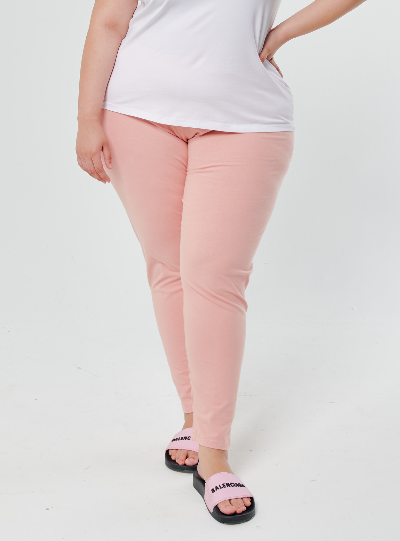 A woman wearing Candy Pink Basic Cotton Legging