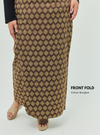 A woman dressed in Coklat Songket Front Fold Songket Skirt