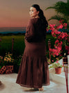 A woman dressed in Dark Coco Lola Cotton Eyelet Princess Dress