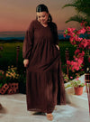 A woman dressed in Dark Coco Lola Cotton Eyelet Princess Dress