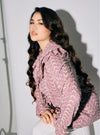A woman dressed in Dusty Purple Maisara Eyelet Ruffles Top