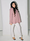 A woman dressed in Dusty Purple Maisara Eyelet Ruffles Top