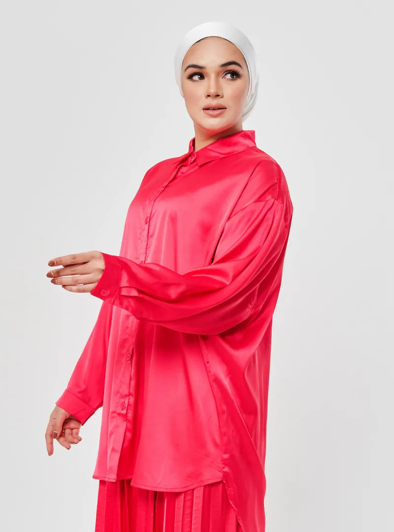 A woman dressed in Hot Pink Dropped Shoulder Satin Shirt