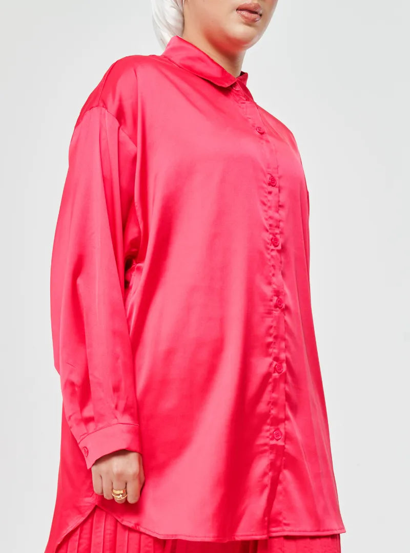 A woman dressed in Hot Pink Dropped Shoulder Satin Shirt