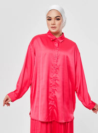 A woman dressed in Hot Pink Dropped Shoulder Satin Shirt