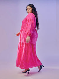A woman dressed in Hot Pink Lola Cotton Eyelet Princess Dress