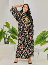 A woman dressed in Jowo Black The Vintage Opah Kurung
