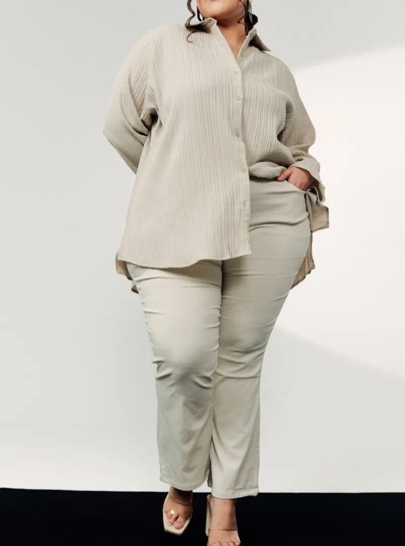 A woman wearing Latte Ms Daphne Bootcut Trouser