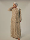 A woman dressed in Latte Tun Habiba Eyelet Set