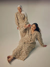 A woman dressed in Latte Tun Habiba Eyelet Set