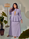 A woman dressed in Lilac Tun Rogayah Eyelet Peplum Kurung
