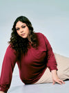 A woman dressed in Maroon Naddy Mandarin Collar Slim Fit Polo Shirt