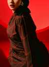 A woman dressed in Maroon Geo Kam Jie Cheongsam Dress