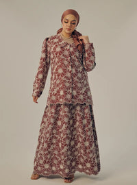 A woman dressed in Maroon Tun Habiba Eyelet Set