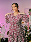 A woman dressed in Maroon Tun Habiba Eyelet Set