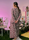 A woman dressed in Maroon Tun Habiba Eyelet Set