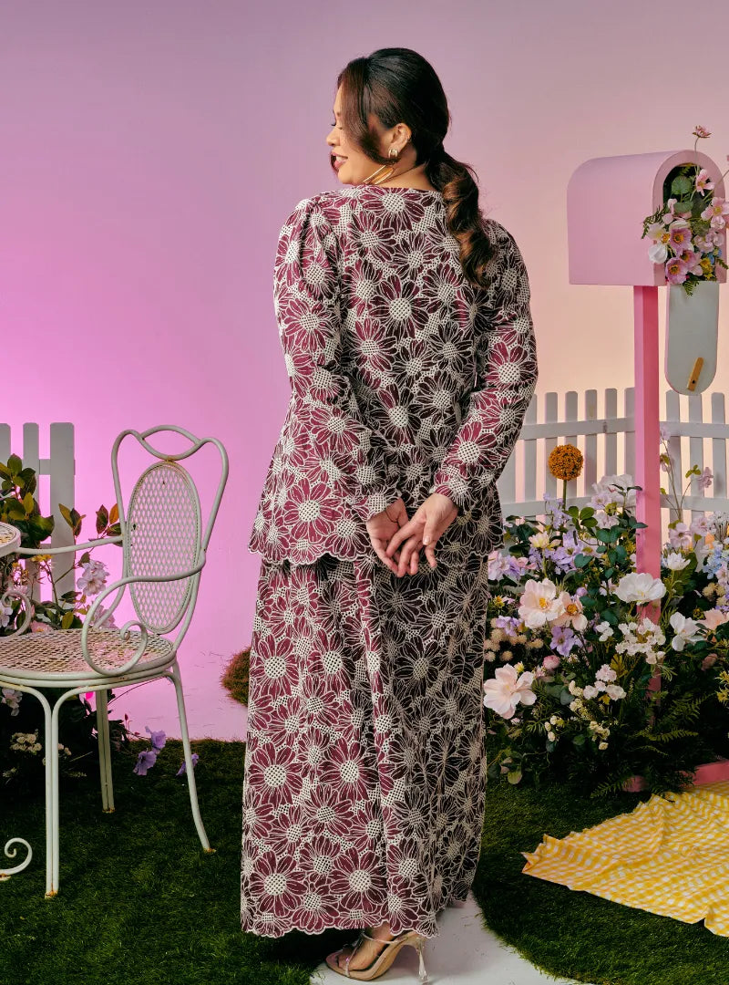 A woman dressed in Maroon Tun Habiba Eyelet Set