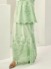 A woman wearing Mint Green Ezzah Eyelet Doll Skirt