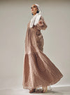 A woman dressed in Mocha Lola Cotton Eyelet Princess Dress