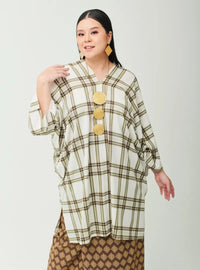 A woman dressed in Mocha Tun Azeeza Kaftan Top