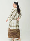 A woman dressed in Mocha Tun Azeeza Kaftan Top
