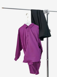 A woman dressed in Mulberry Dropped Shoulder Satin Shirt