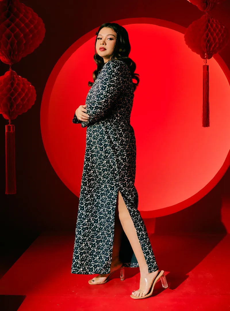 A woman dressed in Navy Daisy Yun Jie Cheongsam Dress